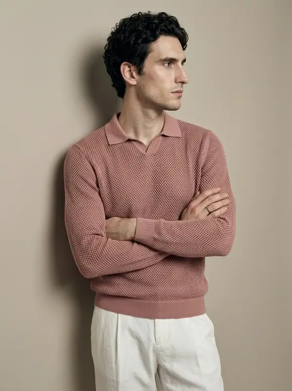 dusty rose open-mesh knit polo worn by an AI male model, studio shoot