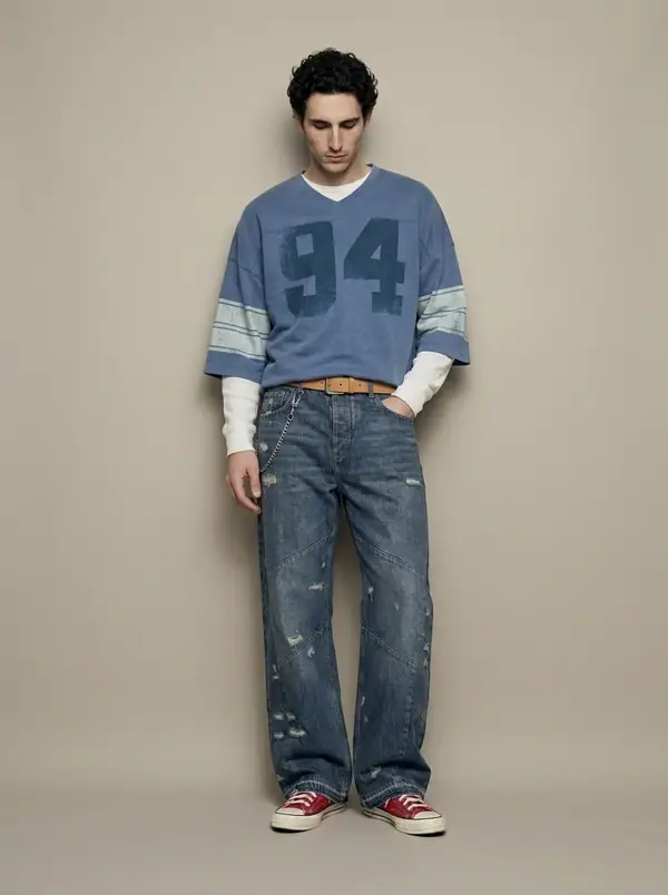 washed blue 94 football jersey tee worn by an AI male model, studio shoot