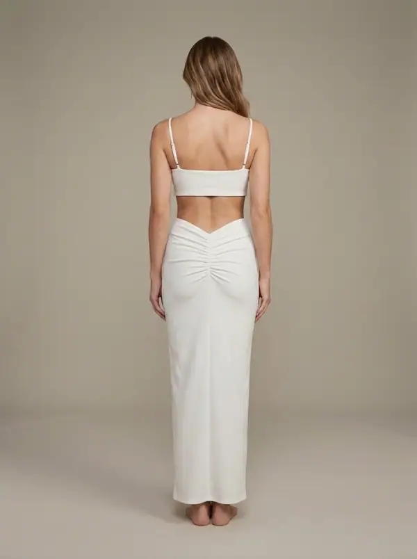 white crop top + high-waist column maxi co-ord, version x worn by an AI model, studio shoot